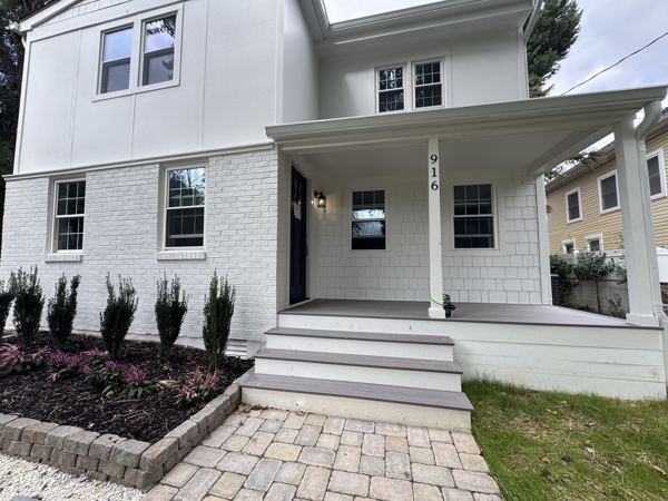 Covered front porch with composite decking