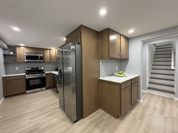 Side-by-side refrigerator and pantry cabinetry