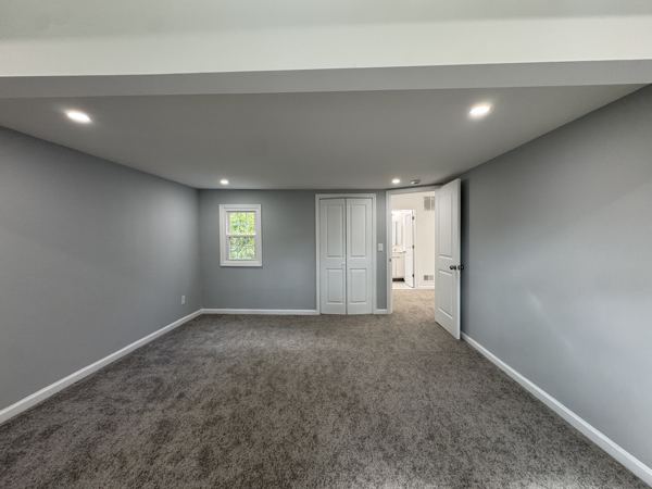 Same upper-level bedroom, another view