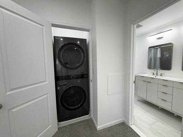Upper-level laundry, stacked LG washer/dryer