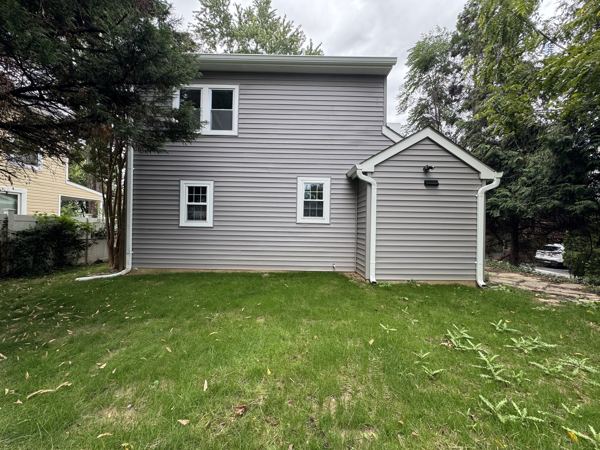 Rear of home with new siding
