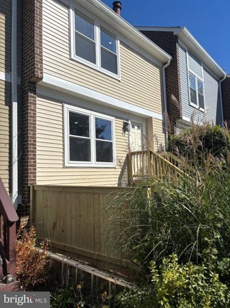 New vinyl siding, windows and roof; new rear deck