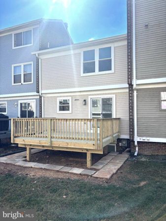 Newly built rear deck with new sliding glass door